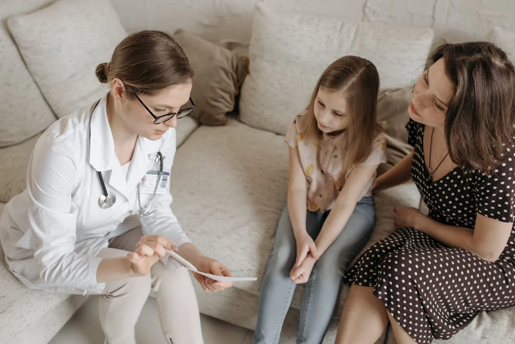 Patient speaking with physician during a consultation